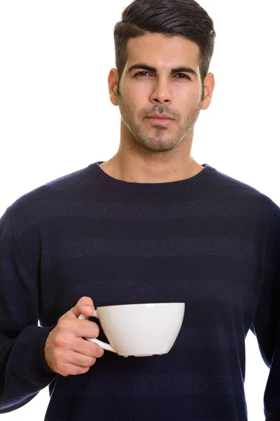 Junger hübscher persischer Mann mit Kaffeetasse — Stockfoto