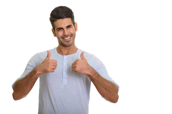 Joven feliz hombre persa sonriendo dando pulgares hacia arriba — Foto de Stock