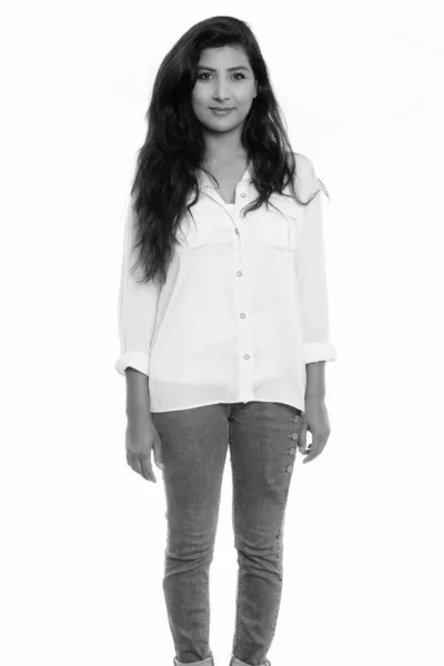 Studio shot of young beautiful Persian woman standing — ストック写真