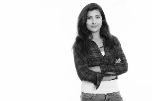 Studio shot of young beautiful Persian woman with arms crossed — ストック写真