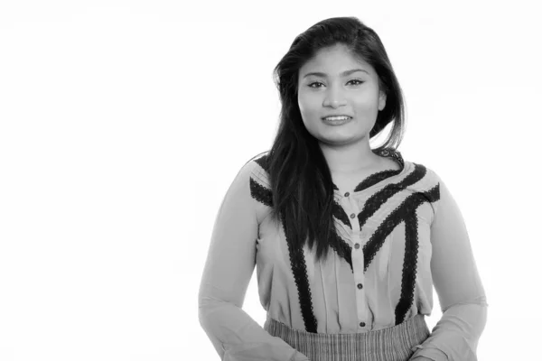 Studio shot of young happy fat Persian businesswoman smiling — Stock Photo, Image