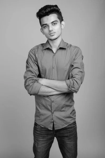 Portrait of young Indian businessman in black and white — ストック写真