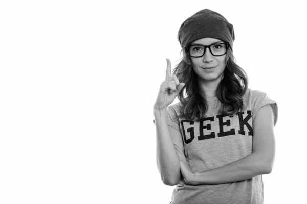 Studio shot van geek girl wijzende vinger omhoog — Stockfoto