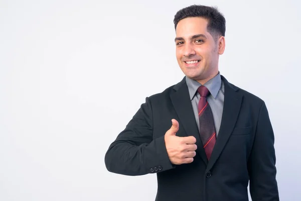 Portret van een gelukkig Perzisch zakenman in pak die duimen opgeeft — Stockfoto