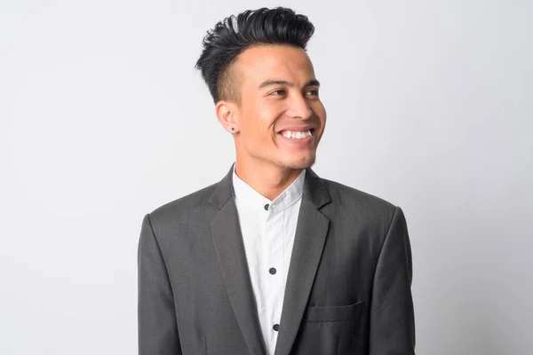 Лицо счастливого молодого азиатского бизнесмена в костюмах — стоковое фото