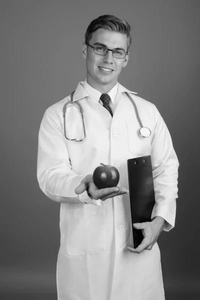 Portrait of young handsome man doctor with eyeglasses in black and white — Φωτογραφία Αρχείου