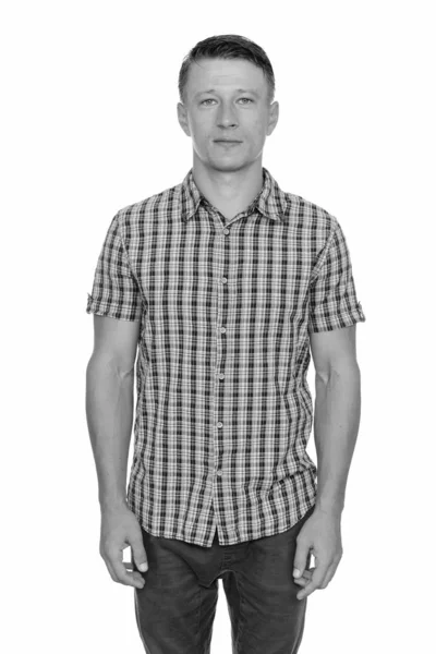 Studio shot of young handsome Caucasian man — Stock Photo, Image