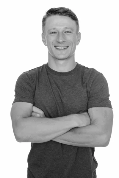 Studio shot of young happy Caucasian man isolated against white background — Stock Photo, Image