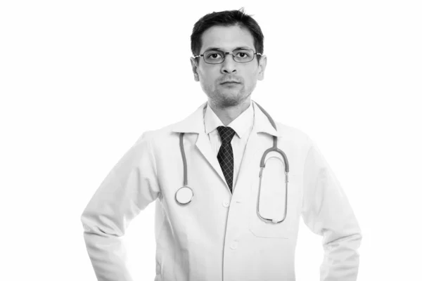 Studio shot of young man doctor wearing eyeglasses — Stock Photo, Image