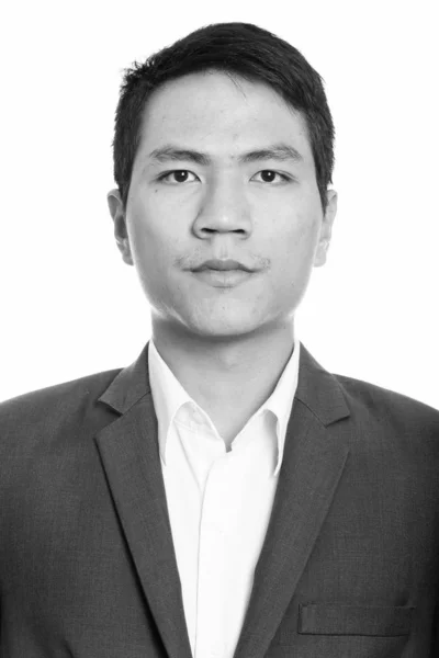 Arca fiatal ázsiai üzletember visel öltöny fekete-fehér — Stock Fotó