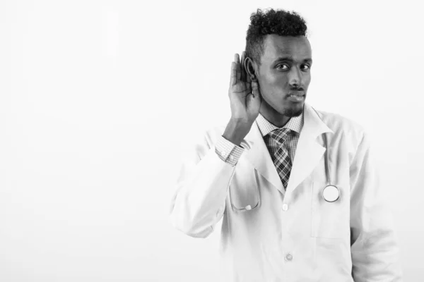 Лікар - бородатий африканець проти білого походження — стокове фото