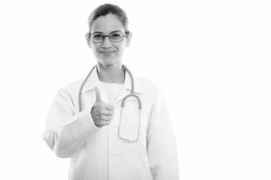 Başparmak vazgeçerek genç güzel kadın doktor stüdyo çekim
