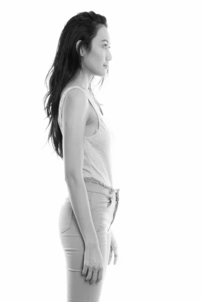 Vedere de profil young beautiful asiatic woman standing — Fotografie, imagine de stoc