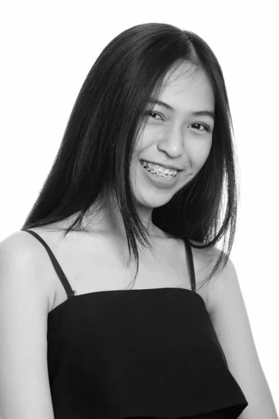 Close up van gelukkig Aziatische tiener meisje glimlachend — Stockfoto