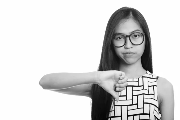 ダウン親指を与える若いアジアの 10 代のオタク少女 — ストック写真