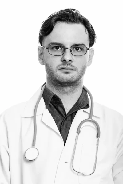 Wajah seorang dokter muda dengan kacamata hitam dan putih — Stok Foto