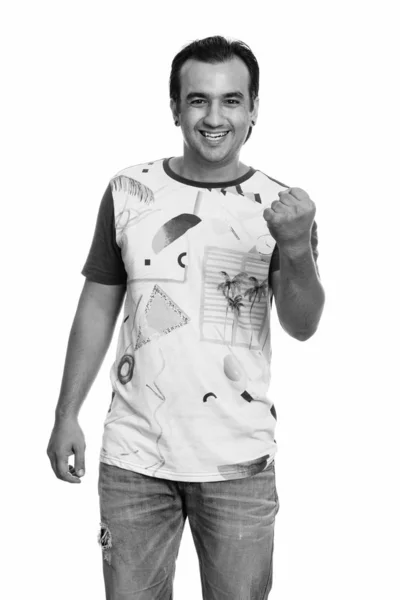 Studio záběr šťastný perské člověka s úsměvem při pohledu motivované — Stock fotografie