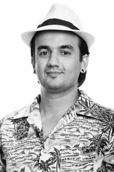 Gesicht eines persischen Touristen mit hawaiianischem Hemd und Hut — Stockfoto