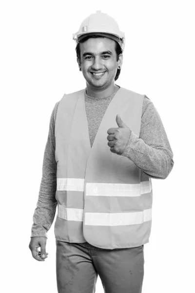 Başparmak verirken gülümseyen mutlu Farsça adam inşaat işçisi — Stok fotoğraf