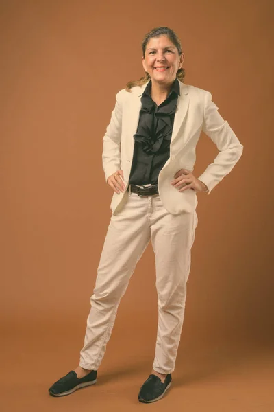 Portrait of mature beautiful businesswoman wearing pantsuit — 스톡 사진