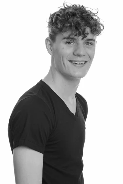 Portrait of young handsome man with curly hair — Stock Photo, Image