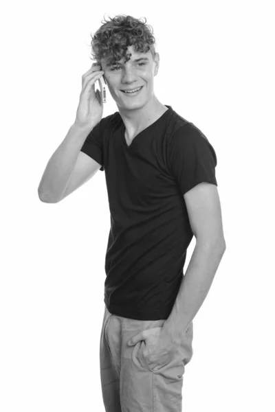 Portrait of young handsome man with curly hair — Stock Photo, Image