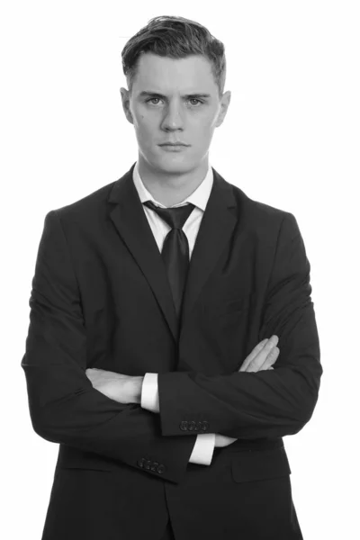 Young handsome businessman with curly hair wearing suit — Stock Photo, Image