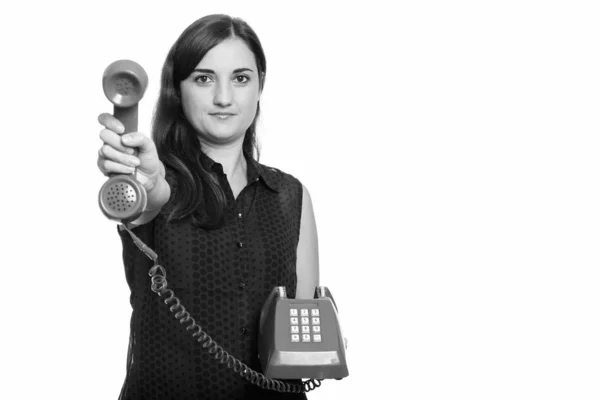 जुन्या टेलिफोन देत सुंदर महिला स्टुडिओ शॉट — स्टॉक फोटो, इमेज