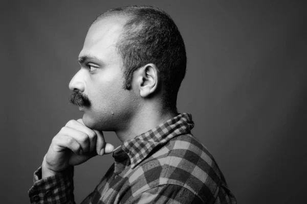 Indian man with mustache against gray background — 스톡 사진