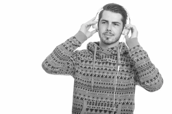 Jeune homme blanc beau écoutant de la musique — Photo