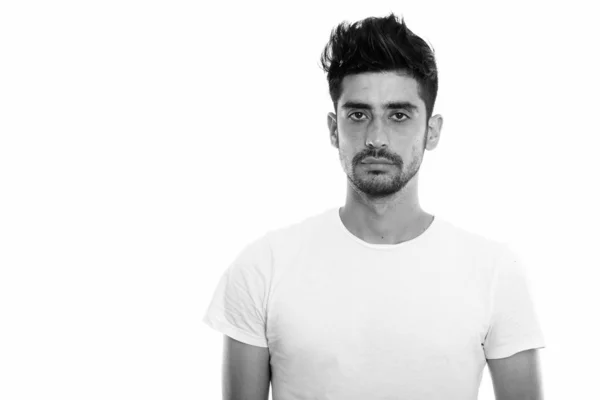 Junger schöner bärtiger persischer Mann in schwarz und weiß — Stockfoto
