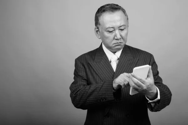 Studio Shot Mature Asian Businessman Gray Background Black White — Fotografia de Stock