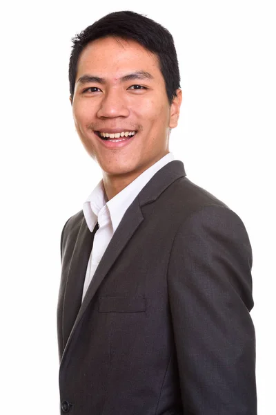 Zbliżenie na młodych szczęśliwy azjatycki biznes biznesmen uśmiechający się — Zdjęcie stockowe