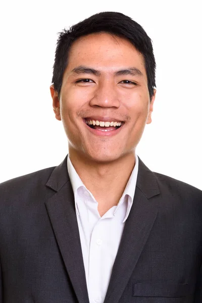 Volto di giovane felice uomo d'affari asiatico sorridente — Foto Stock