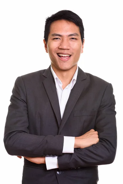 Primo piano di giovane uomo d'affari asiatico con le braccia incrociate — Foto Stock