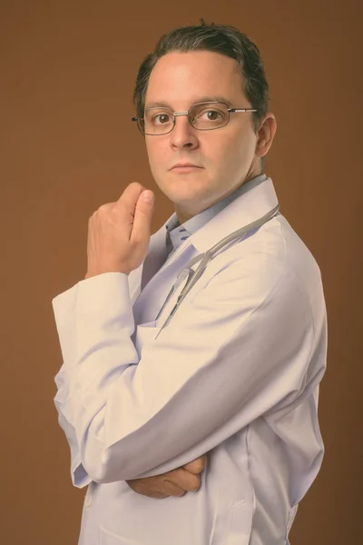 Portrait of Italian man doctor with eyeglasses