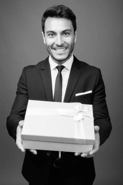 Studio Shot Young Handsome Hispanic Businessman Wearing Suit Gray Background — Stock Photo, Image