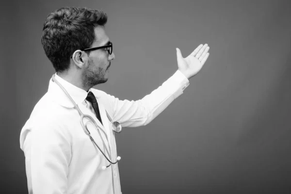 Studio Shot Young Handsome Hispanic Man Doctor Wearing Eyeglasses Gray — Stock Photo, Image