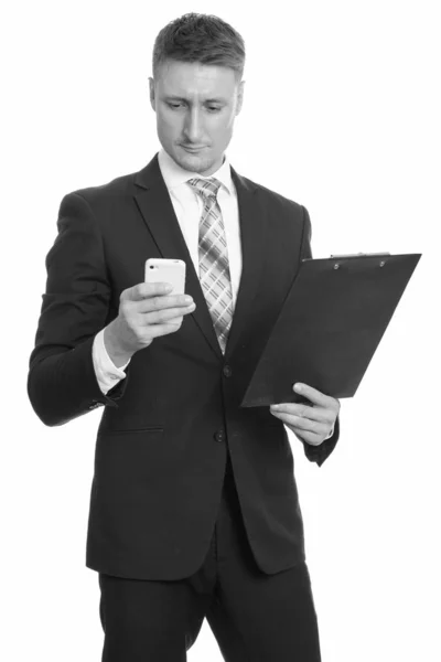 Studioaufnahme Eines Jungen Gutaussehenden Geschäftsmannes Anzug Isoliert Vor Weißem Hintergrund — Stockfoto