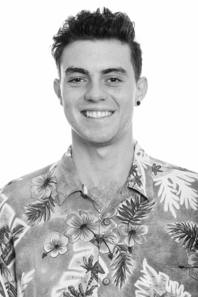 Studio shot of happy young man smiling — Stock Photo, Image