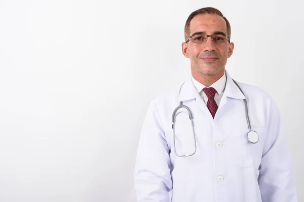 Portrait of mature handsome Persian man doctor — Stock Photo, Image