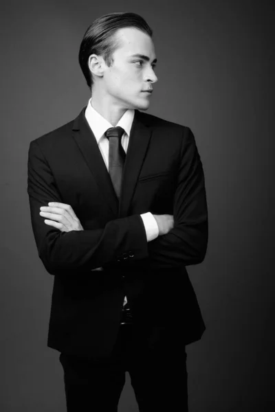 Studio Shot Young Businessman Wearing Suit Gray Background Black White — Stock Photo, Image