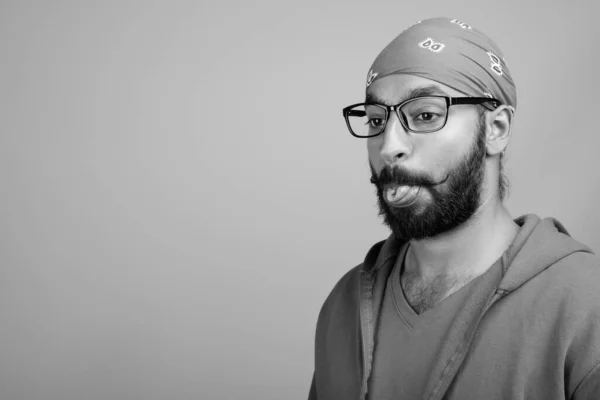 Studio Shot Young Handsome Bearded Indian Man Wearing Eyeglasses Gray — Stock Fotó