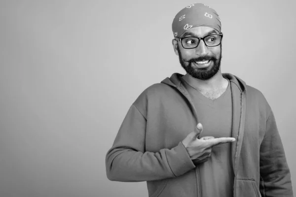 Studio Shot Young Handsome Bearded Indian Man Wearing Eyeglasses Gray — Stockfoto