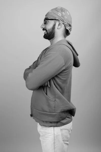 Studio Shot Young Handsome Bearded Indian Man Wearing Eyeglasses Gray — Stockfoto