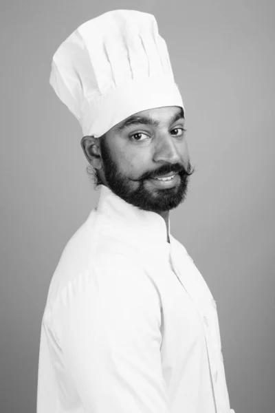 Studio Shot Young Handsome Bearded Indian Man Chef Gray Background — Zdjęcie stockowe