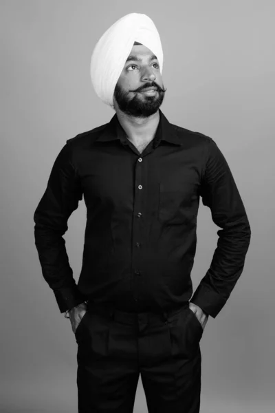 Studio Shot Young Bearded Indian Sikh Businessman Turban Gray Background — Zdjęcie stockowe