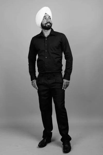Studio Shot Young Bearded Indian Sikh Businessman Turban Gray Background — Zdjęcie stockowe