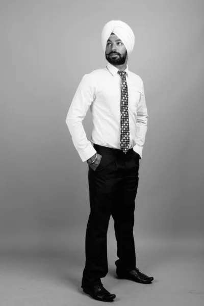 Studio Shot Young Bearded Indian Sikh Businessman Turban Gray Background — Stock fotografie