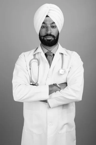 Studio Shot Young Handsome Bearded Indian Sikh Man Doctor Gray — Fotografia de Stock